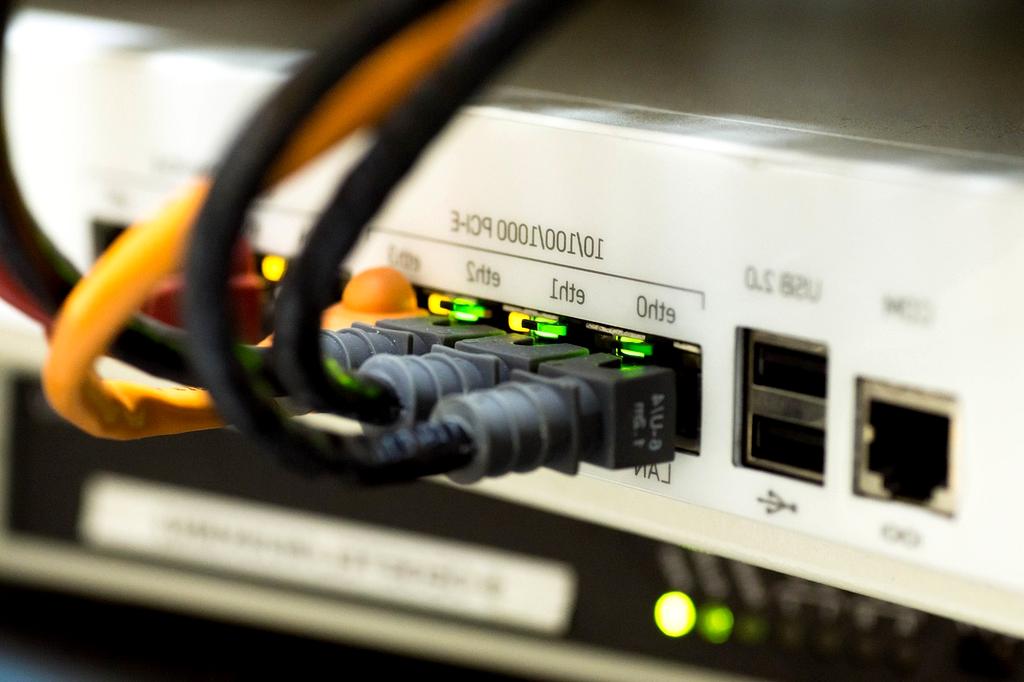 Close-up of wired Ethernet cables connected